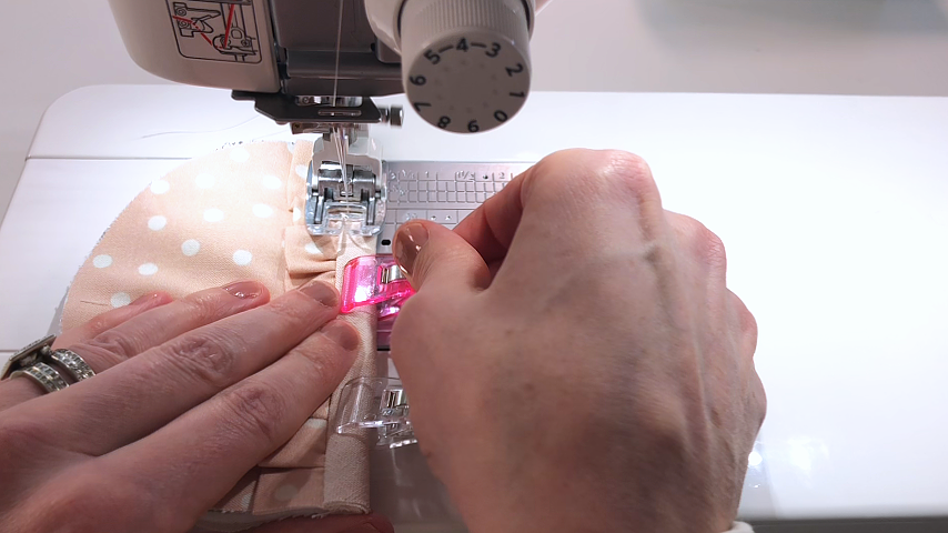 sewing bias tape on pocket