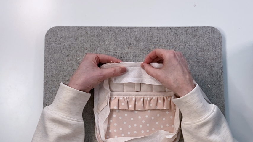 Sew bias tape on up to center