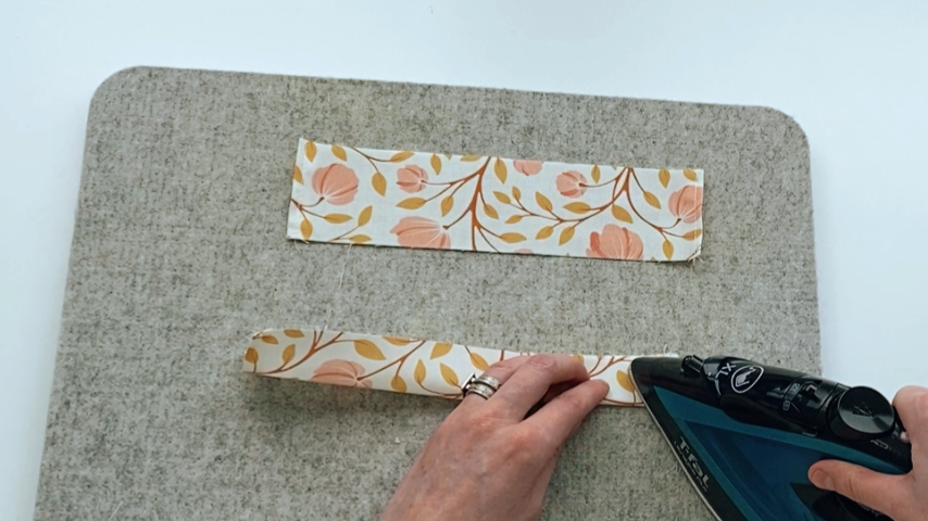 fold drawstring pockets in half lengthwise