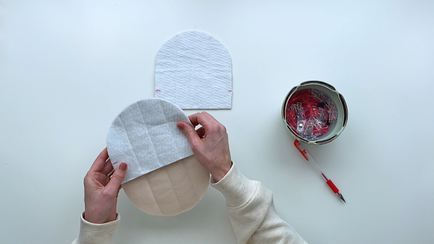 placing thumb and middle pieces together