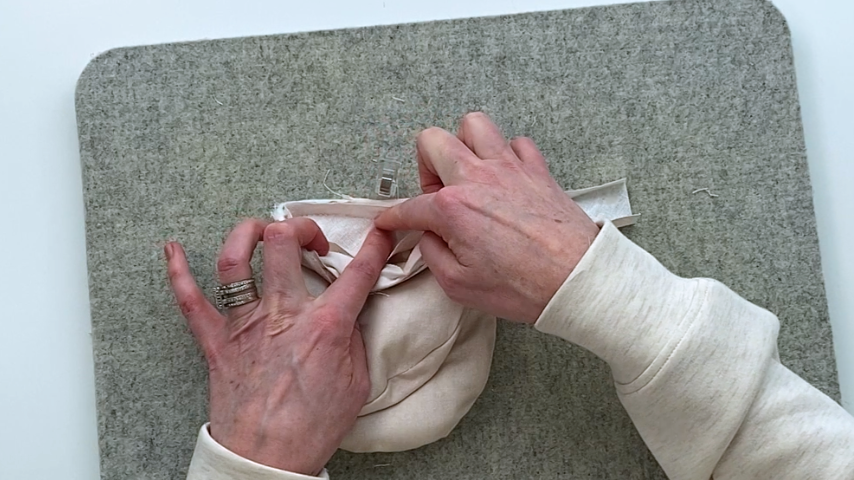 sew end of bias tape up to center